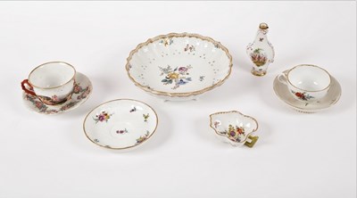 Lot 130 - A Meissen strainer painted bouquets and sprigs,...