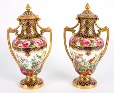 Lot 175 - A pair of Copeland two-handled vases and...