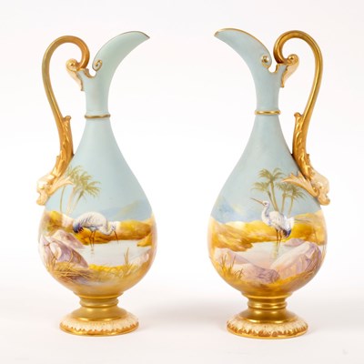 Lot 215 - A pair of Royal Worcester small ewers, each...