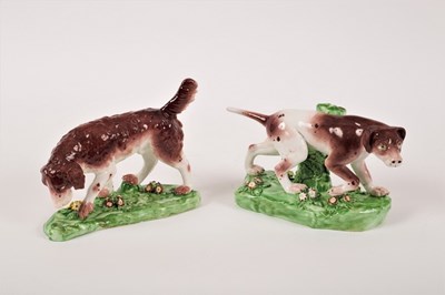 Lot 224 - Two Derby style models of hunting dogs, one a...