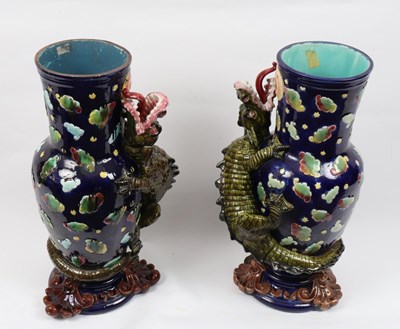 Lot 291 - A pair of blue ground decorative vases each...