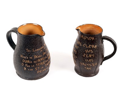 Lot 294 - Two Doulton stoneware jugs, the Landlord's...