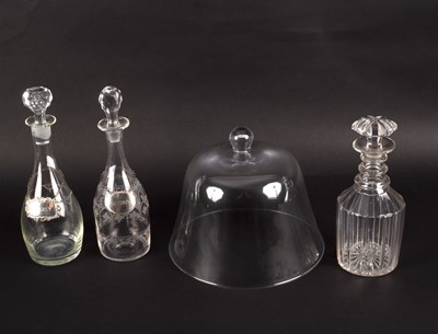 Lot 325 - Three glass decanters, two with silver labels...