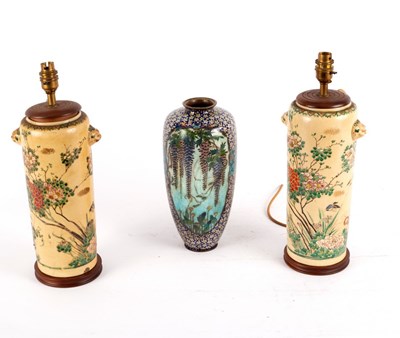 Lot 348 - A cloisonné vase with reserves of birds in...