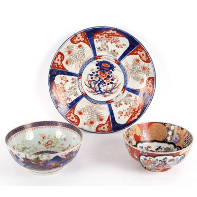 Lot 373 - A Chinese punch bowl with clobbered decoration...