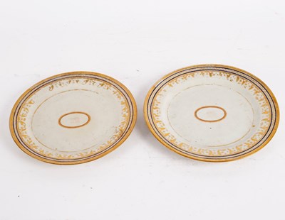 Lot 380 - A pair of Chinese export plates, inscribed in...