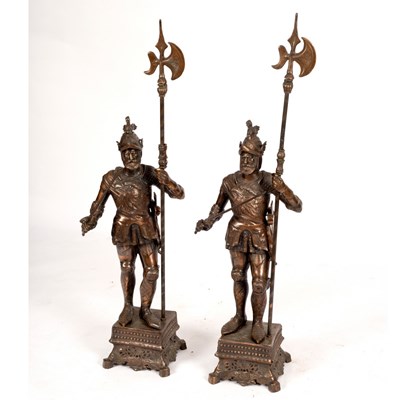 Lot 394 - A pair of fire ornaments modelled as...