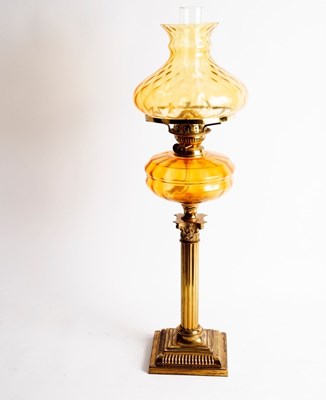 Lot 404 - A 19th Century oil lamp with glass shade and...