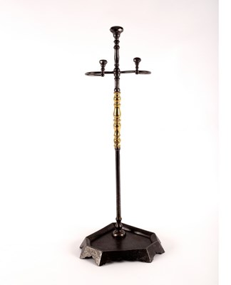 Lot 429 - A burnished steel stick stand, 73cm high