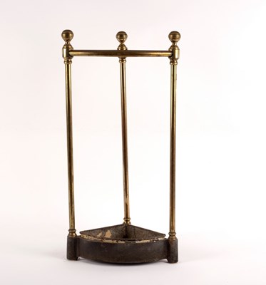 Lot 435 - A brass corner stick stand, 63cm high