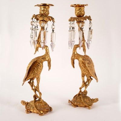 Lot 457 - A pair of gilt metal figural candlesticks,...