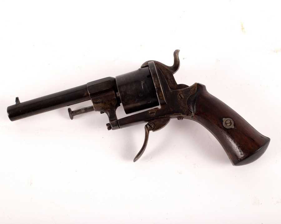 Click A Revolver Lot 477 - A Belgian pinfire revolver with folding