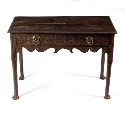 Lot 554 - A 18th Century oak side table fitted a drawer...