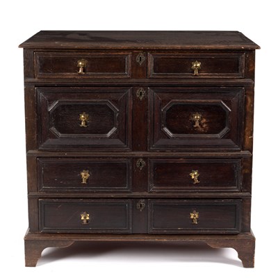 Lot 568 - A 17th Century style oak chest of four long...