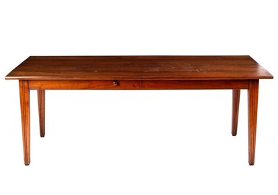 Lot 570 - A French cherry wood farmhouse table, the...