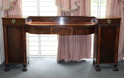 Lot 573 - A Regency mahogany pedestal sideboard,...