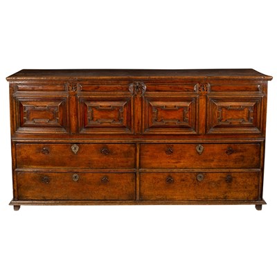 Lot 575 - An 18th Century oak mule chest, the hinged...