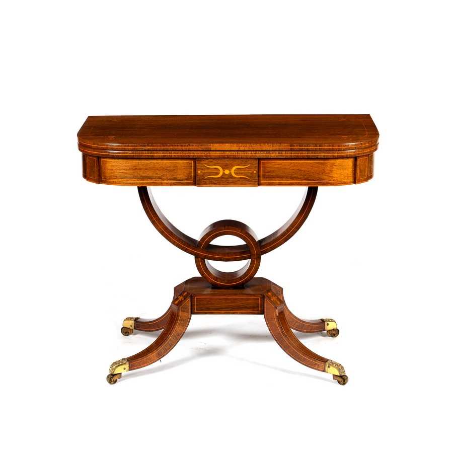 Lot 588 - A George IV rosewood card table inlaid boxwood...