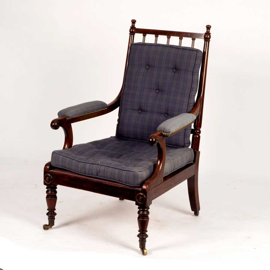Lot 592 - A George IV mahogany library chair with