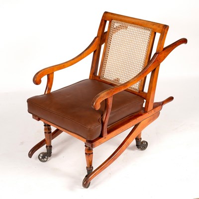 Lot 597 - A late Victorian invalids chair with cane seat...