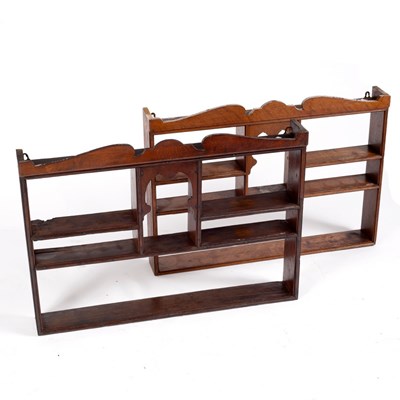 Lot 607 - A pair of oak spice racks with moulded...