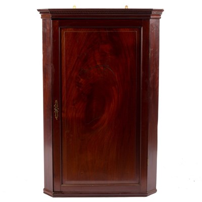 Lot 608 - An early 18th Century mahogany corner cupboard...