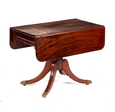 Lot 611 - A William IV mahogany two-flap table, fitted a...