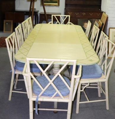 Lot 630 - A green and cream painted dining room suite,...