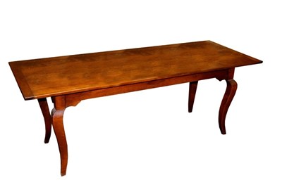 Lot 639 - A cherry wood peg jointed table on square...