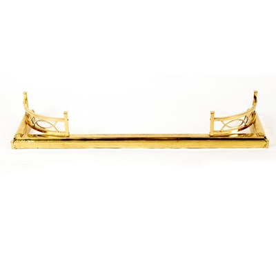 Lot 655 - A rectangular brass fire fender with pierced...