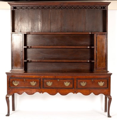 Lot 667 - A 19th Century oak dresser, the rack fitted...