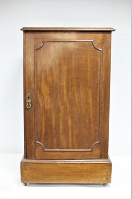 Lot 681 - A Georgian mahogany pedestal cupboard, fitted...