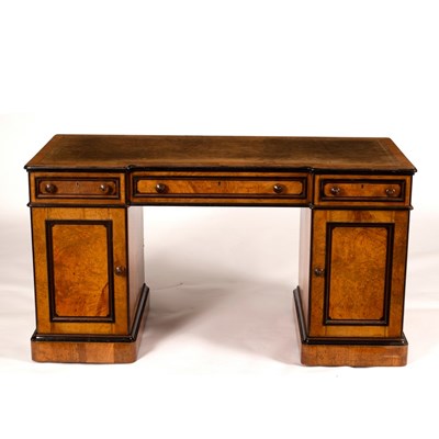 Lot 682 - A breakfront kneehole desk by Lamb of...