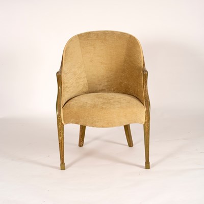 Lot 702 - A tub armchair upholstered in pale green...