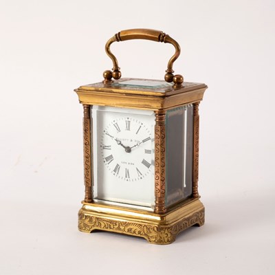 Lot 752 - A small gilt brass and engraved carriage clock,...