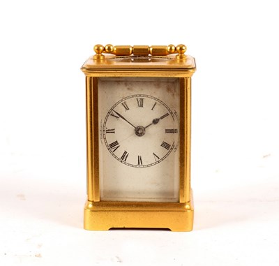 Lot 754 - A small carriage clock in a gilt brass case,...