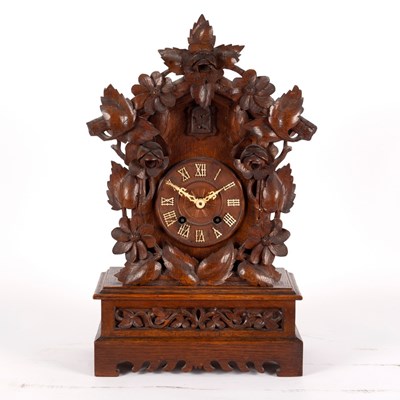 Lot 764 - A Black Forest type cuckoo clock, 52cm high