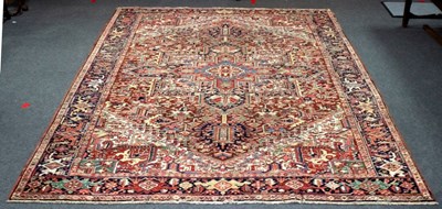 Lot 772 - A Persian Heriz carpet, early 20th Century, of...