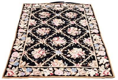 Lot 796 - A modern needlepoint rug decorated roses among...