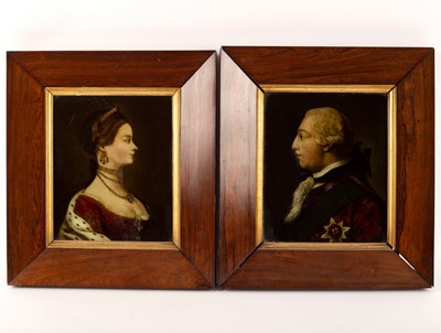 Lot 879 - A pair of reverse glass pictures/George III...