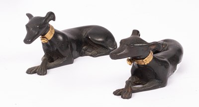 Lot 193 - A pair of bronze recumbent greyhounds