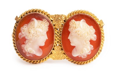 Lot 14 - A late 19th Century double cameo brooch, set...