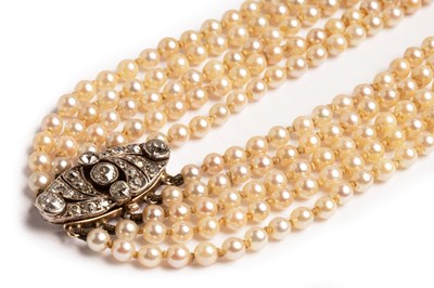 Lot 38 - An early 20th Century five strand pearl...