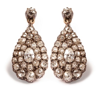 Lot 39 - A pair of 18ct gold and diamond drop earrings...