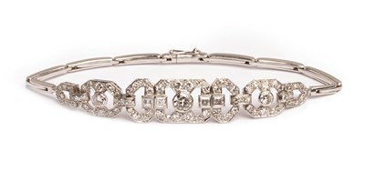 Lot 46 - An Art Deco diamond bracelet, the central...