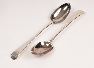Lot 106 - A pair of George III silver basting spoons,...
