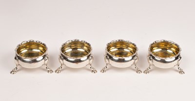 Lot 110 - A set of four George II silver and silver gilt...