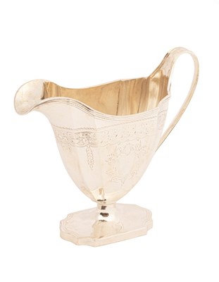 Lot 131 - A George III helmet-shaped silver cream jug,...