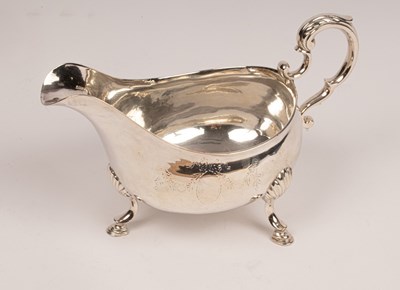 Lot 137 - A George III silver sauce boat, makers mark...