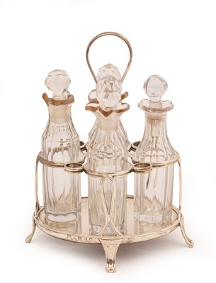 Lot 144 - A George III silver and cut glass cruet stand,...